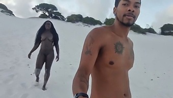 Black Snake Emerges From Sand And Penetrates Mulatto'S Anus In Arousing Video